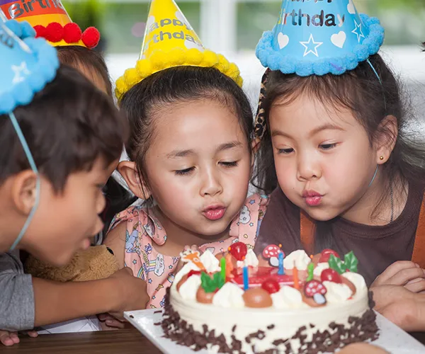 Happy kids posing at a birthday party venue