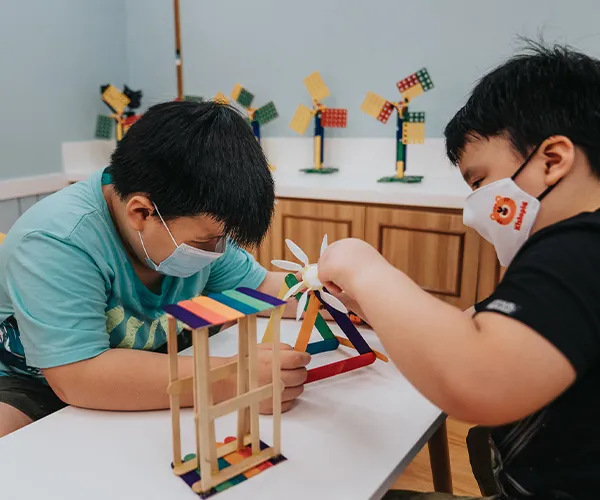Young learner interacting with educational toys